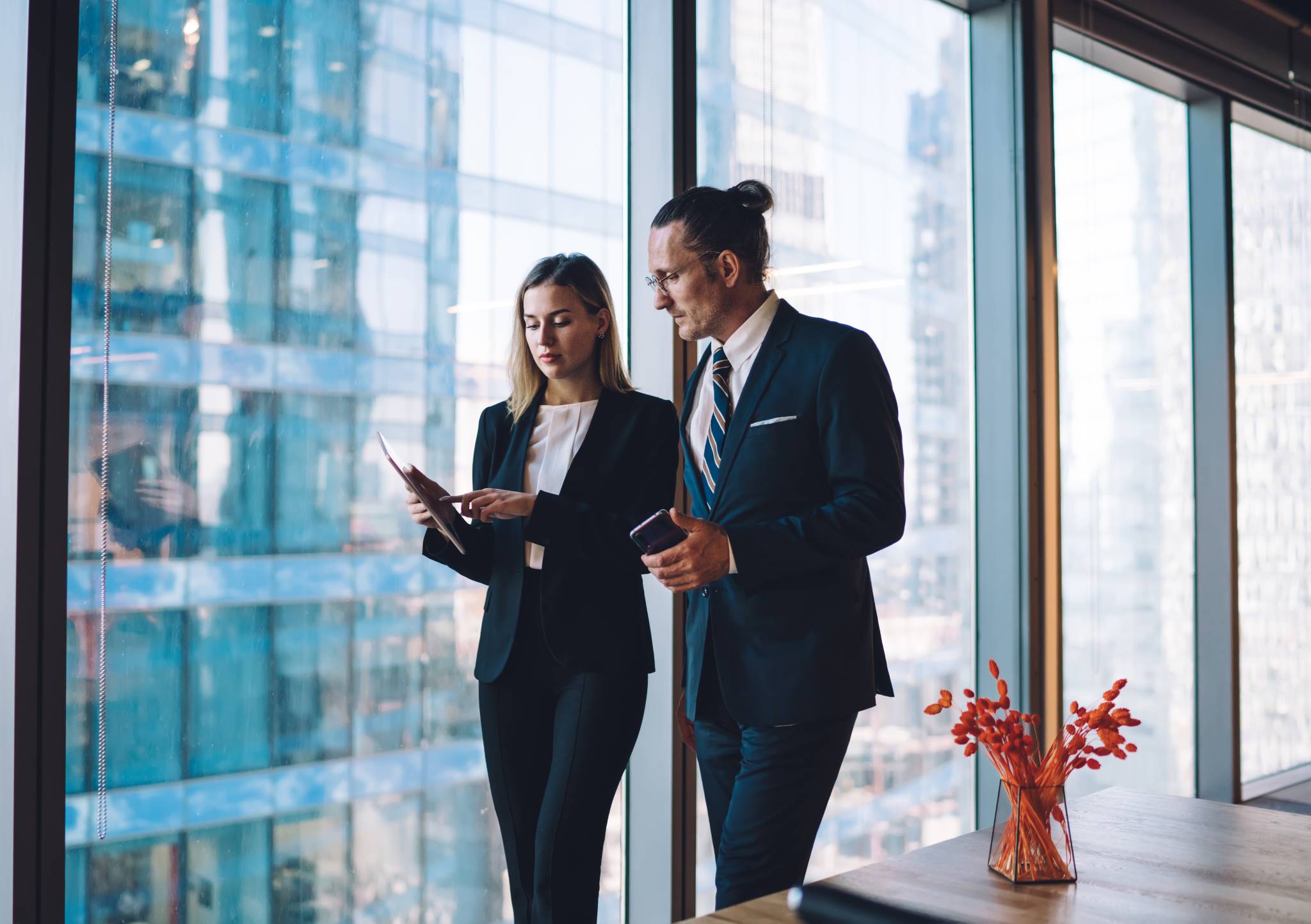 A financial advisor talks to her client